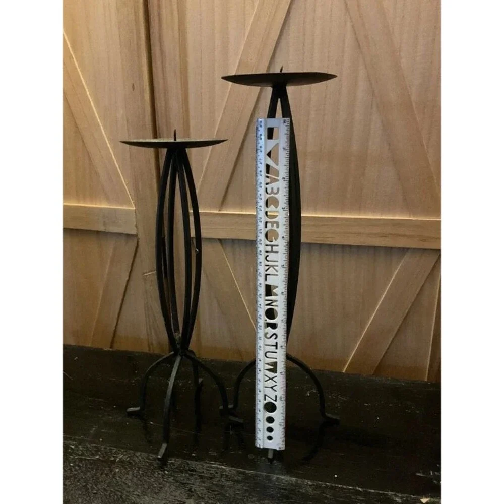 Set of black metal candle holders
